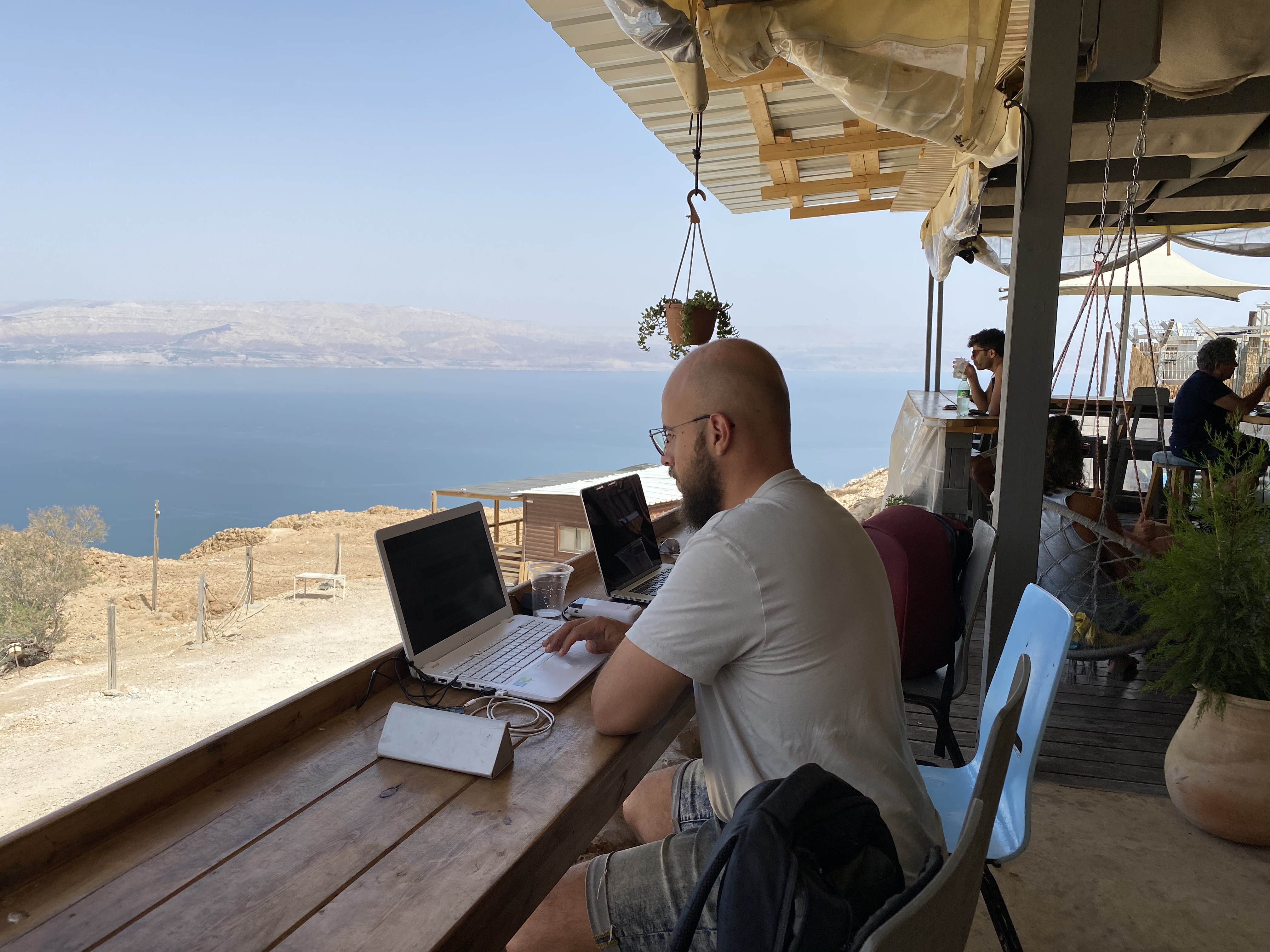Gideon working outdoors above the Dead Sea